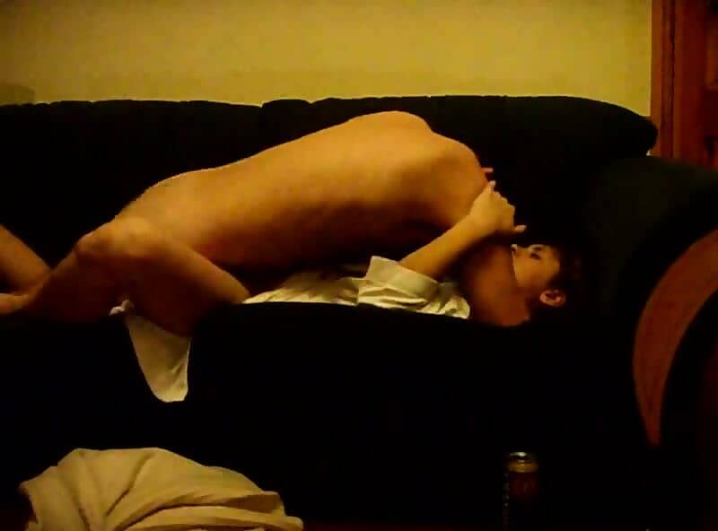 Amateur couple fuck on their black couch